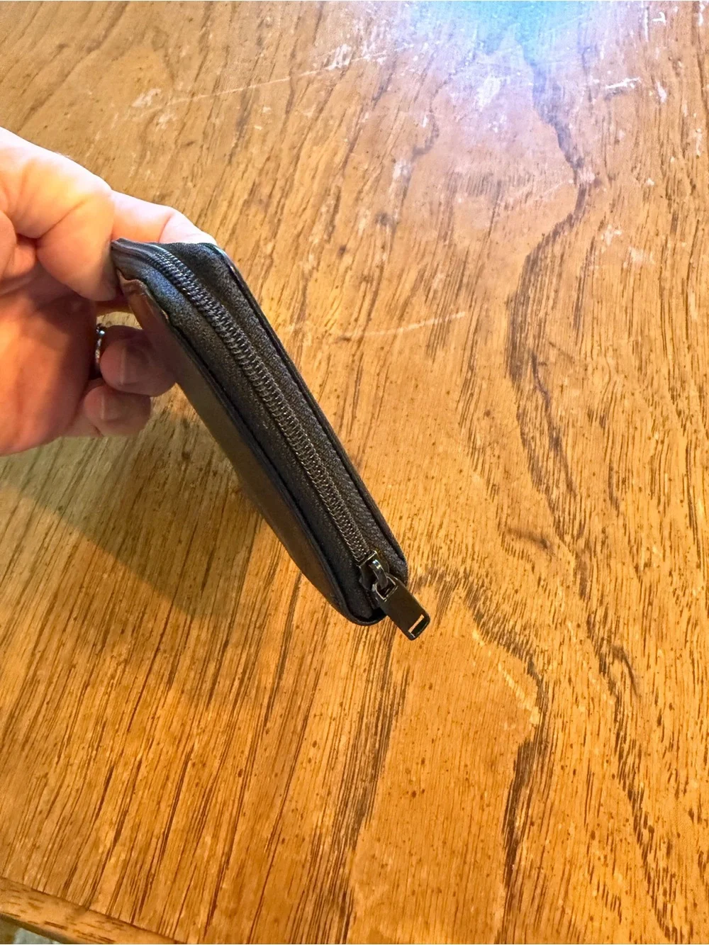 Brookstone Black Leather Zip Wallet with Embossed Logo